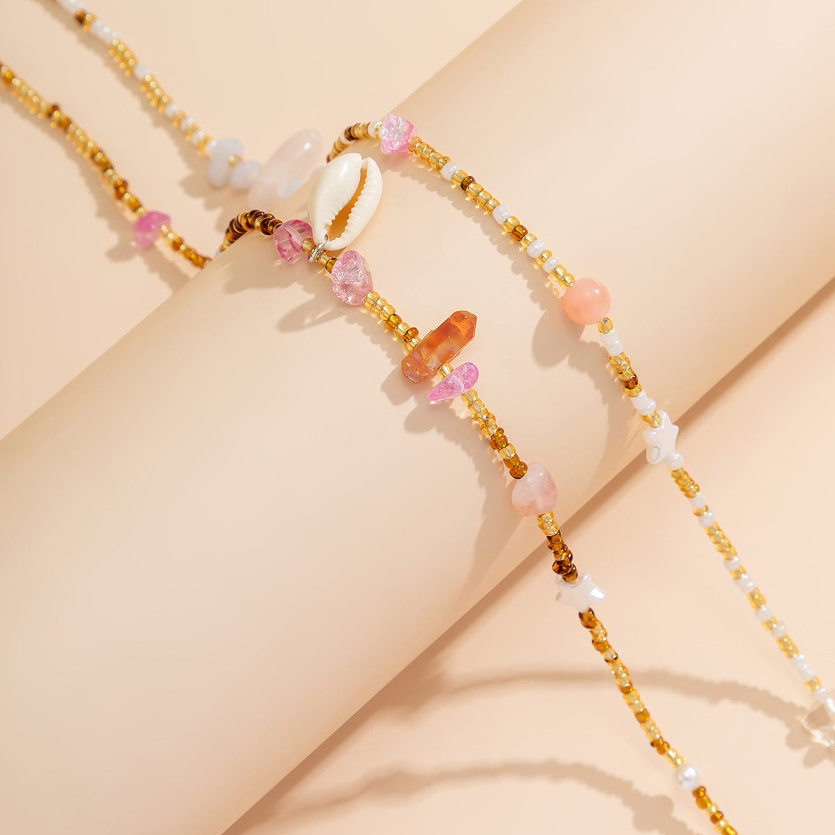 Chaîne de Ventre Coquillage Cauri Bohème en Perles dorées Roses