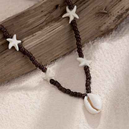 Collier Coquillage Surfeur