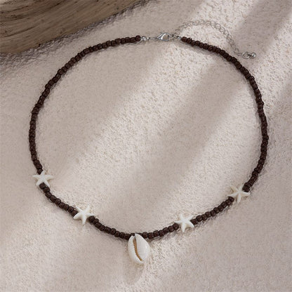 Collier Coquillage Surfeur